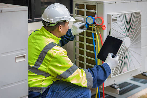 Professional Heat Pump Repair technician working in Paris, TN